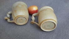 Set of two stoneware wheel thrown mugs