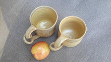 Set of two stoneware wheel thrown mugs